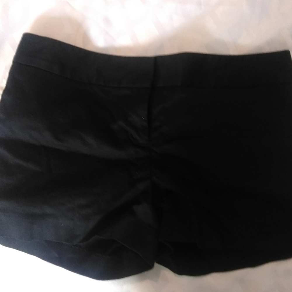 Express black shorts with white stripes on sides